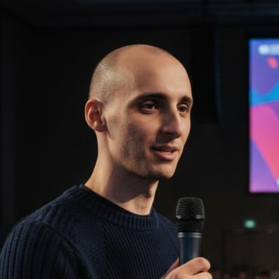 Professional headshot of Miklos Petridisz, Lead Data Engineer and Solutions Architect with experience at Databricks and Microsoft